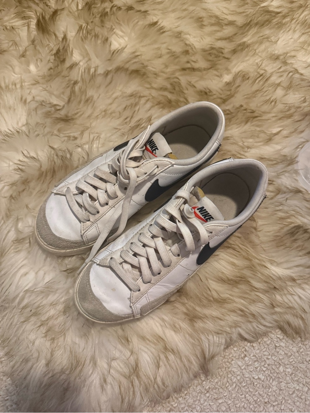 Nike White Sneakers with Black Swoosh